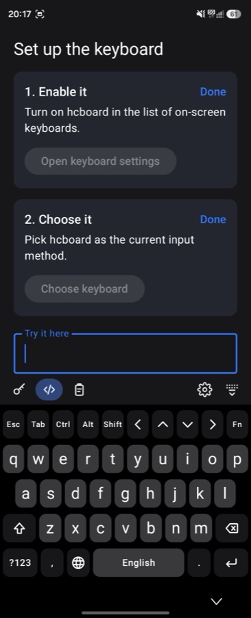 The phone board in dark mode with a strip of Esc, Tab, Ctrl, Alt, Shift, arrows and Fn above the letters